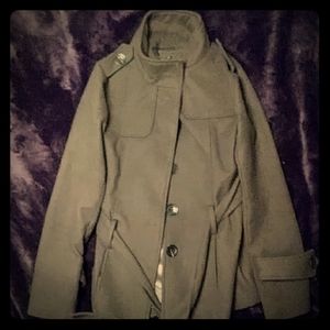 A olive green brand new coat.